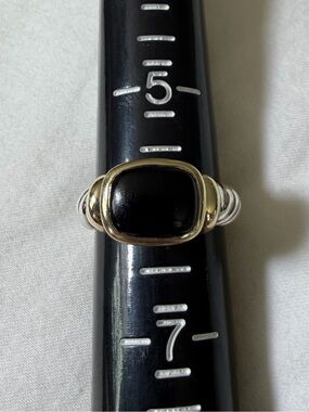 David Yurman Noblesse ring black onyx—
14k yellow gold and sterling silver.